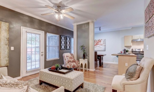 a living room with a fan