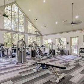 Quick access to state-of-the-art amenities a gym with exercise equipment