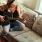 a woman playing a guitar