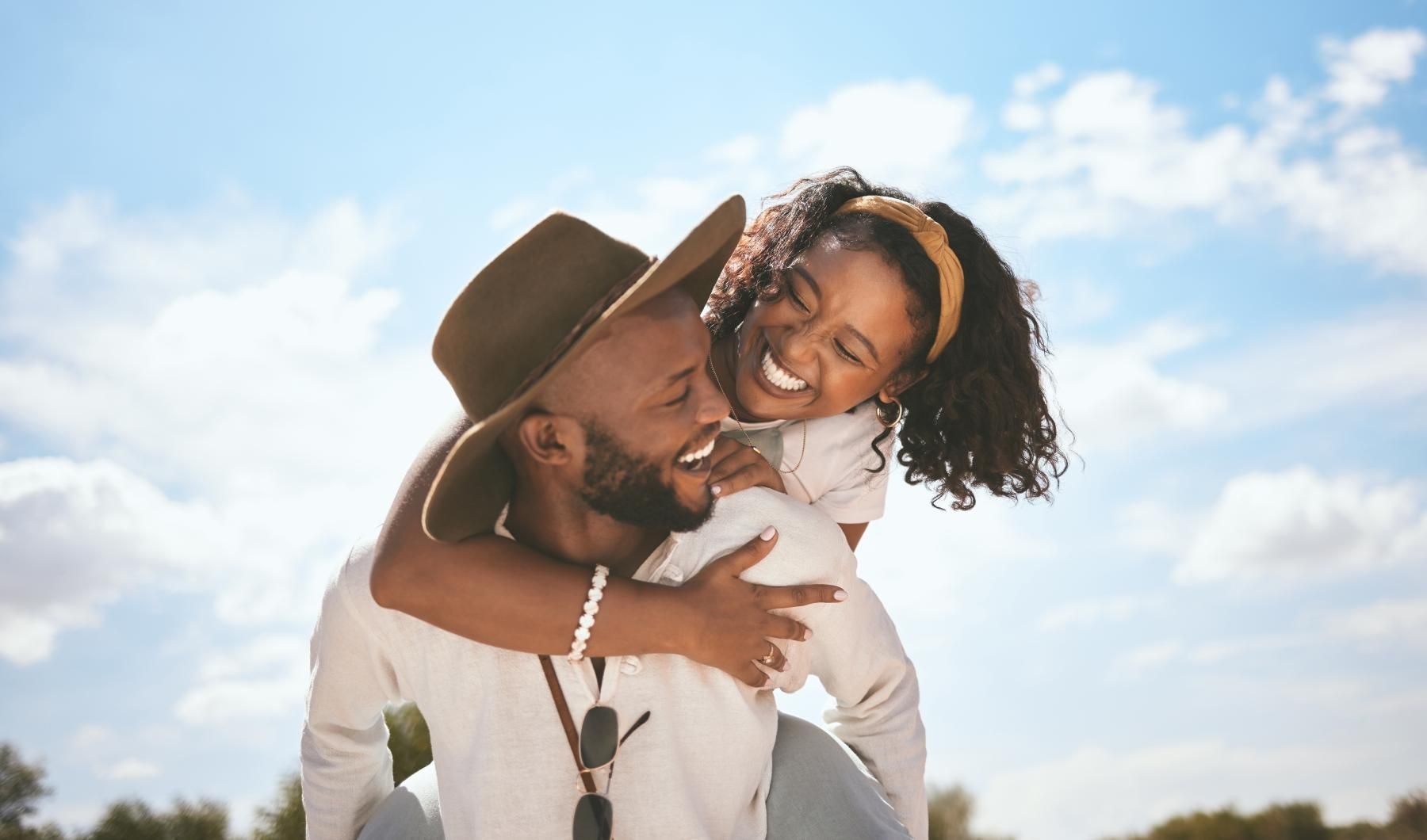 Find your perfect fit at Highlands Hill Country Apartments a man and woman kissing