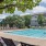 a pool with chairs around it