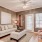 a living room with a white couch and a white table